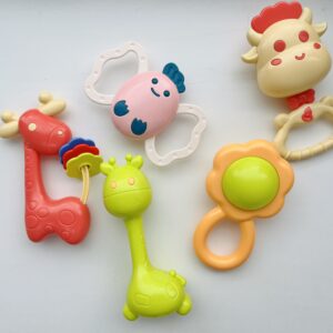 Погремушки для новорожденных